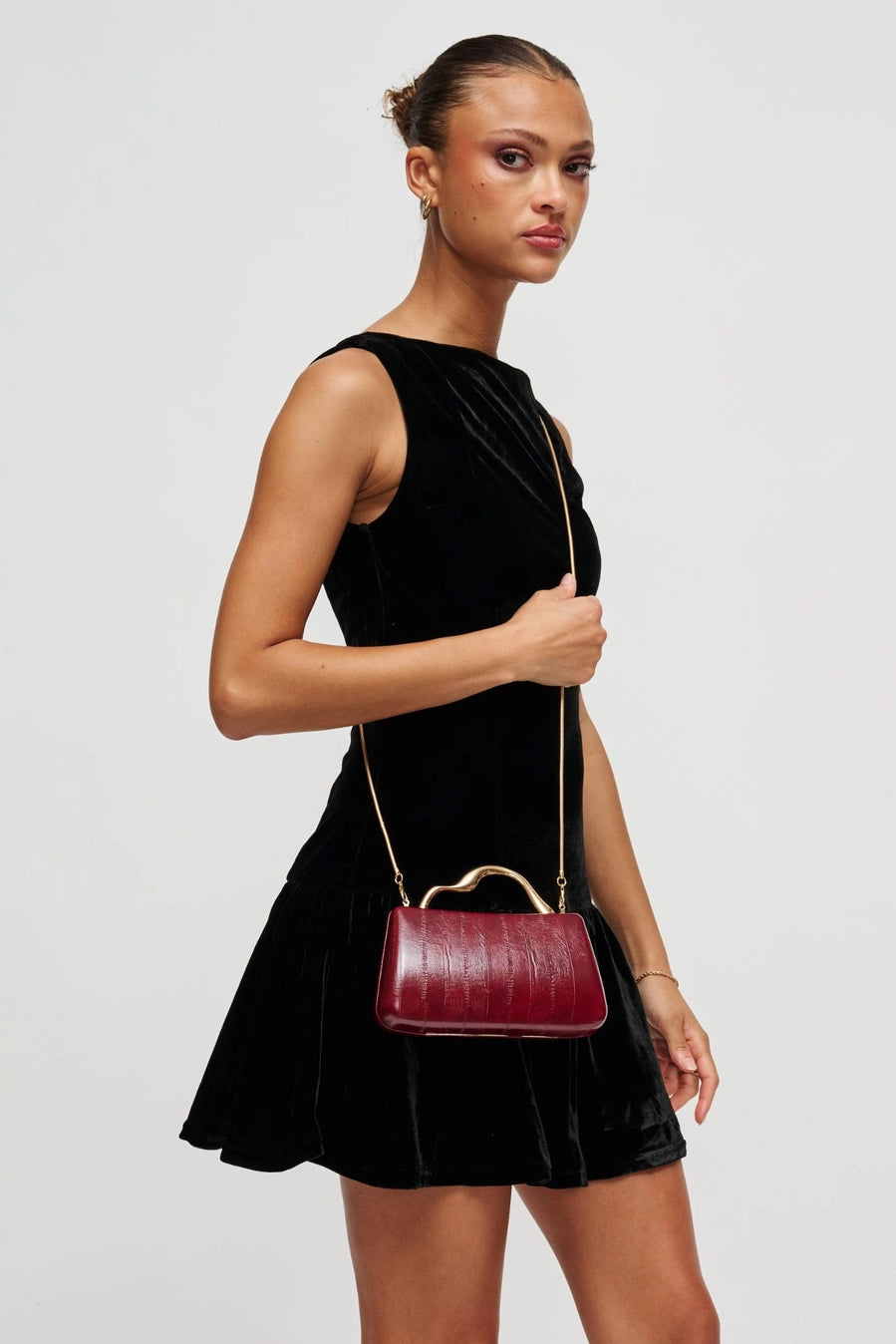 Nichelle Sculptural Handle Clutch Burgundy